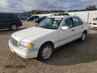 ✅ 1995 Mercedes-Benz C 2.8L • VIN: WDBHA28E1SF151911 • Лот: 76814424. Опубликован ранее на Copart с пробегом 128 184 миль. Бесплатный доступ к архиву аукционных продаж из США и подробный отчёт об истории автомобиля на DreamBid. Изображение 1.