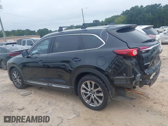 ✅ 2018 Mazda CX-9 Grand Touring • VIN: JM3TCADY9J0229571 • Lot: 43011548. Listed on IAAI with 147,896 mi. Free auction sales archive from the USA and detailed vehicle history report at DreamBid. Image 14.