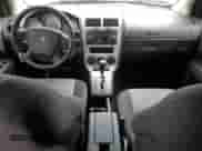 2009 Dodge Caliber SXT с VIN 1B3HB48A39D118651, выставлен на аукционе Copart как лот 56374274 с пробегом 122 952 миль миль и Списание • Salvage title. История ставок и продаж доступна на DreamBid. Изображение 8.