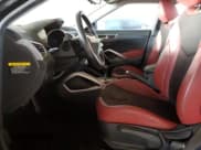 ✅ 2012 Hyundai Veloster w/Red Int • VIN: KMHTC6AD3CU058993 • Lot: 44230704. Wystawiony na Copart z przebiegiem Nie podano. Bezpłatny archiwum sprzedaży aukcyjnych z USA i szczegółowy raport historii pojazdu na DreamBid. Zdjęcie 7.