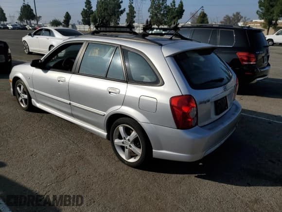 ✅ 2003 Mazda Protege • VIN: JM1BJ246331220991 • Лот: 86839925. Опубликован ранее на Copart с пробегом 118 760 миль. Бесплатный доступ к архиву аукционных продаж из США и подробный отчёт об истории автомобиля на DreamBid. Изображение 2.