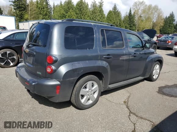 ✅ 2010 Chevrolet HHR LS • VIN: 3GNBAADB2AS582577 • Lot: 52772525. Listed on Copart with 159,673 mi. Free auction sales archive from the USA and detailed vehicle history report at DreamBid. Image 3.