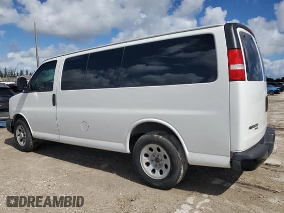 ✅ 2014 Chevrolet Express Passenger LS • VIN: 1GNSGBF44E1147795 • Lot: 90305755. Listed on Copart with 124,358 mi. Free auction sales archive from the USA and detailed vehicle history report at DreamBid. Image 2.