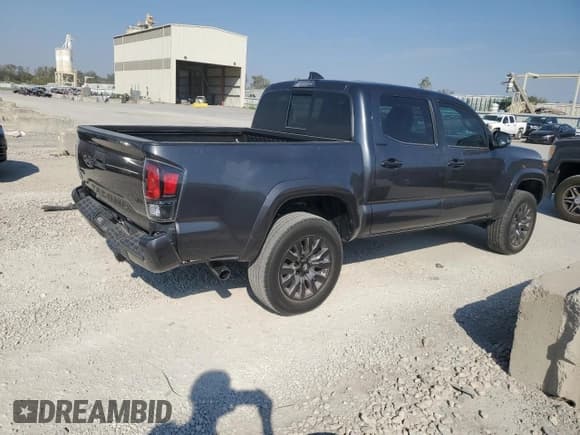 ✅ 2021 Toyota Tacoma Limited • VIN: 3TMGZ5AN1MM380464 • Lot: 86884305. Listed on Copart with 63,425 mi. Free auction sales archive from the USA and detailed vehicle history report at DreamBid. Image 3.
