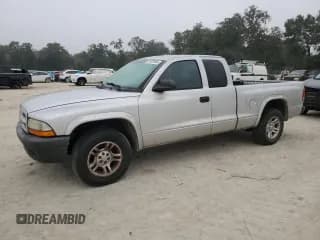 ✅ 2003 Dodge Dakota • VIN: 1D7HL12X13S325796 • Lot: 86339384. Wystawiony na Copart z przebiegiem 124 830 mil. Bezpłatny archiwum sprzedaży aukcyjnych z USA i szczegółowy raport historii pojazdu na DreamBid. Zdjęcie 1.