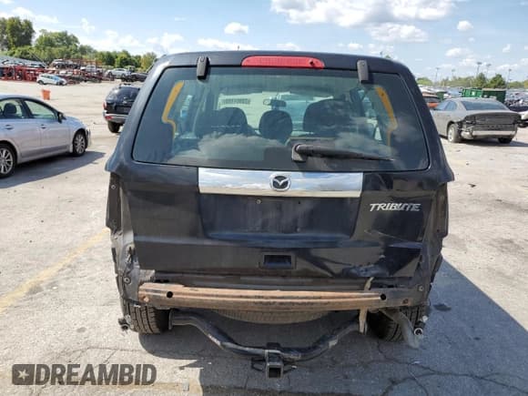 ✅ 2010 Mazda Tribute Sport • VIN: 4F2CY0C72AKM09136 • Lot: 70951185. Listed on Copart with 157,610 mi. Free auction sales archive from the USA and detailed vehicle history report at DreamBid. Image 6.