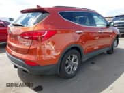 ✅ 2014 Hyundai Santa Fe • VIN: 5XYZUDLB4EG138898 • Lot: 42196491. Listed on IAAI with Not provided. Free auction sales archive from the USA and detailed vehicle history report at DreamBid. Image 4.