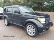 ✅ 2011 Dodge Nitro Heat • VIN: 1D4PU4GK8BW602617 • Lot: 42359467. Listed on IAAI with 91,118 mi. Free auction sales archive from the USA and detailed vehicle history report at DreamBid. Image 1.