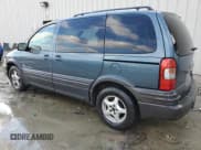 ✅ 2004 Pontiac Montana • VIN: 1GMDU03E64D160424 • Лот: 81909314. Опубликован ранее на Copart с пробегом 148 663 миль. Бесплатный доступ к архиву аукционных продаж из США и подробный отчёт об истории автомобиля на DreamBid. Изображение 2.