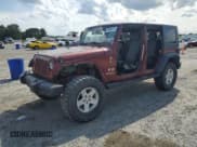 ✅ 2007 Jeep Wrangler X • VIN: 1J4GA39117L106338 • Lot: 59905575. Listed on Copart with 159,309 mi. Free auction sales archive from the USA and detailed vehicle history report at DreamBid. Image 1.