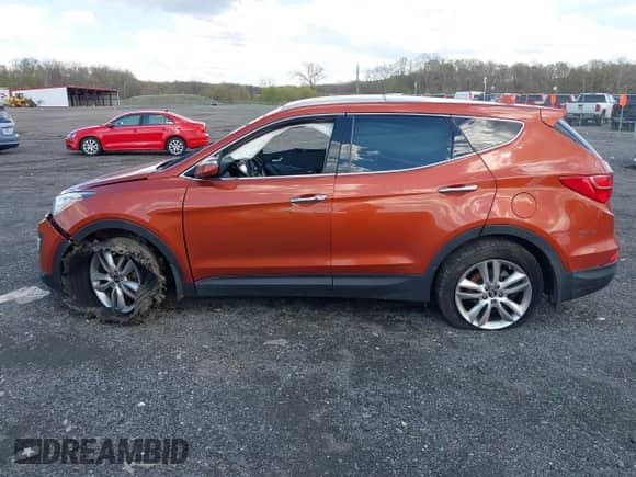 2013 Hyundai Santa Fe Sport z VIN 5XYZW3LA3DG027866, wystawiony jako IAAI lot #42028668 z przebiegiem 110 609 mil mil oraz . Historia ofert i sprzedaży dostępna na DreamBid. Obrazek 14.