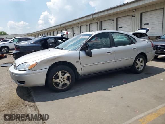 ✅ 2004 Ford Taurus SES • VIN: 1FAHP55S64G148159 • Lot: 68862385. Listed on Copart with 240,782 mi. Free auction sales archive from the USA and detailed vehicle history report at DreamBid. Image 1.