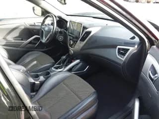 ✅ 2016 Hyundai Veloster • VIN: KMHTC6AD6GU260023 • Lot: 41627353. Wystawiony na IAAI z przebiegiem 98 472 mil. Bezpłatny archiwum sprzedaży aukcyjnych z USA i szczegółowy raport historii pojazdu na DreamBid. Zdjęcie 5.