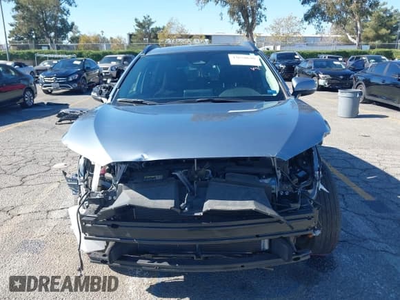 ✅ 2024 Toyota Corolla Cross LE • VIN: 7MUBAAAG5RV074005 • Lot: 43650690. Listed on IAAI with 28,494 mi. Free auction sales archive from the USA and detailed vehicle history report at DreamBid. Image 13.