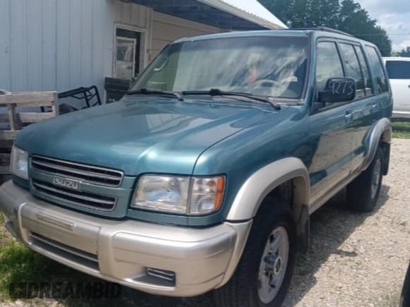 ✅ 2002 Isuzu Trooper S • VIN: JACDJ58X727J09867 • Lot: 42590444. Listed on IAAI with 152,172 mi. Free auction sales archive from the USA and detailed vehicle history report at DreamBid. Image 2.