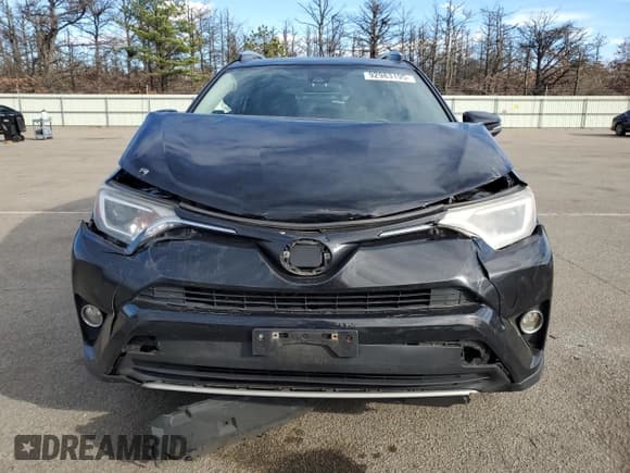 ✅ 2018 Toyota RAV4 XLE • VIN: 2T3RFREV4JW789586 • Лот: 92983195. Опубликован ранее на Copart с пробегом 102 443 миль. Бесплатный доступ к архиву аукционных продаж из США и подробный отчёт об истории автомобиля на DreamBid. Изображение 5.