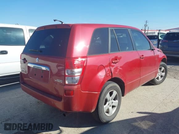 ✅ 2013 Suzuki Grand Vitara Premium • VIN: JS3TE0D64D4100244 • Lot: 41388355. Listed on IAAI with 179,620 mi. Free auction sales archive from the USA and detailed vehicle history report at DreamBid. Image 4.