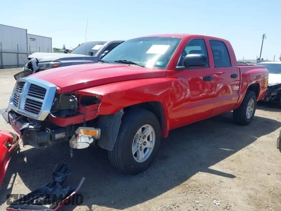 2006 Dodge Dakota SLT with VIN 1D7HE48NX6S588584, listed as a IAAI auction lot 42348429 with 246,965 mi miles and . Bid and sale history available at DreamBid. Image 15.