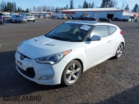 ✅ 2014 Hyundai Veloster • VIN: KMHTC6AD9EU185928 • Lot: 41720927. Wystawiony na IAAI z przebiegiem 94 023 mil. Bezpłatny archiwum sprzedaży aukcyjnych z USA i szczegółowy raport historii pojazdu na DreamBid. Zdjęcie 2.