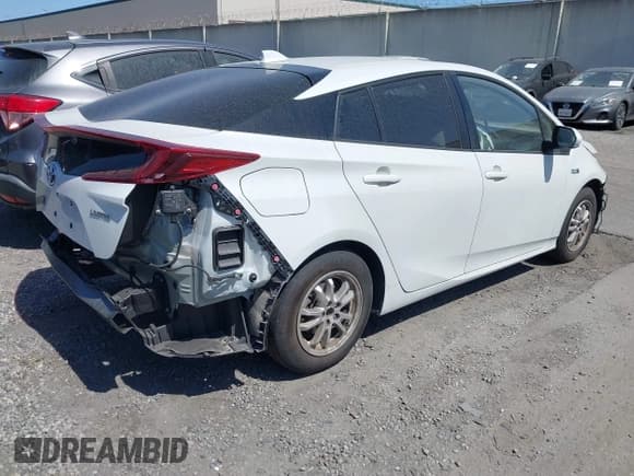 ✅ 2021 Toyota Prius LE • VIN: JTDKAMFP7M3183029 • Лот: 42422014. Опубликован ранее на IAAI с пробегом 58 121 миль. Бесплатный доступ к архиву аукционных продаж из США и подробный отчёт об истории автомобиля на DreamBid. Изображение 4.