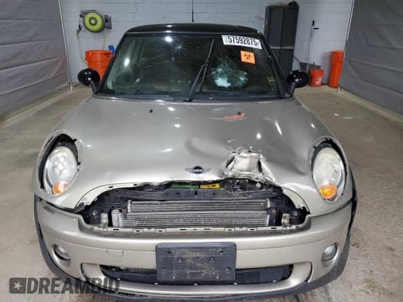 2010 MINI Hardtop with VIN WMWMF3C50ATZ66791, listed as a Copart auction lot 57592875 with Not provided miles and Salvage title. Bid and sale history available at DreamBid. Image 5.