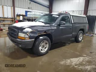 ✅ 2002 Dodge Dakota • VIN: 1B7FL16X32S557570 • Lot: 88974295. Wystawiony na Copart z przebiegiem 201 791 mil. Bezpłatny archiwum sprzedaży aukcyjnych z USA i szczegółowy raport historii pojazdu na DreamBid. Zdjęcie 1.