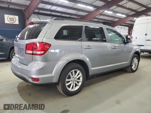 ✅ 2016 Dodge Journey SXT • VIN: 3C4PDDBG5GT159906 • Lot: 87462195. Listed on Copart with 99,864 mi. Free auction sales archive from the USA and detailed vehicle history report at DreamBid. Image 3.