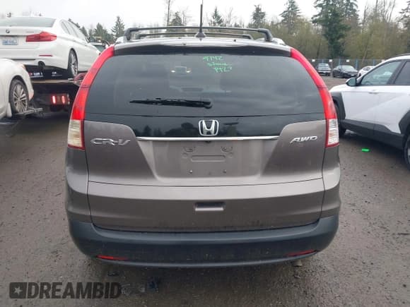 ✅ 2012 Honda CR-V EX-L • VIN: 5J6RM4H79CL017543 • Lot: 43835370. Listed on IAAI with 230,989 mi. Free auction sales archive from the USA and detailed vehicle history report at DreamBid. Image 16.