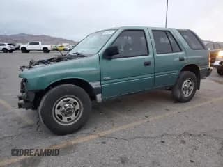 ✅ 1996 Isuzu Rodeo • VIN: 4S2CK58E1T4331031 • Lot: 78573514. Listed on Copart with 218,994 mi. Free auction sales archive from the USA and detailed vehicle history report at DreamBid. Image 1.