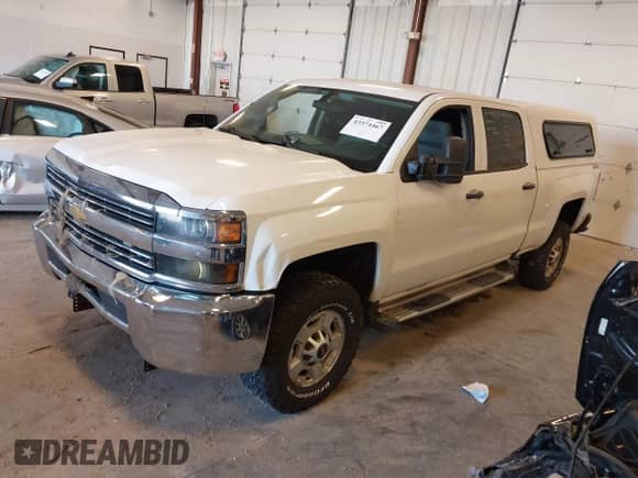 2016 Chevrolet Silverado 2500HD Work Truck z VIN 1GC1KUEG8GF104724, wystawiony jako IAAI lot #43374467 z przebiegiem Nie podano mil oraz . Historia ofert i sprzedaży dostępna na DreamBid. Obrazek 2.