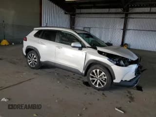 ✅ 2022 Toyota Corolla Cross XLE • VIN: 7MUDAABG9NV032776 • Lot: 86178745. Wystawiony na Copart z przebiegiem 17 407 mil. Bezpłatny archiwum sprzedaży aukcyjnych z USA i szczegółowy raport historii pojazdu na DreamBid. Zdjęcie 4.