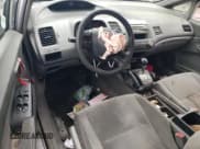 ✅ 2006 Honda Civic DX • VIN: 1HGFA16216L142100 • Лот: 56650235. Опубликован ранее на Copart с пробегом 353 916 миль. Бесплатный доступ к архиву аукционных продаж из США и подробный отчёт об истории автомобиля на DreamBid. Изображение 8.