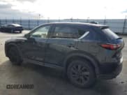✅ 2023 Mazda CX-5 S Premium • VIN: JM3KFBDM3P0174484 • Lot: 92454755. Wystawiony na Copart z przebiegiem 60 989 mil. Bezpłatny archiwum sprzedaży aukcyjnych z USA i szczegółowy raport historii pojazdu na DreamBid. Zdjęcie 2.