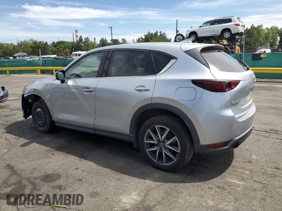 ✅ 2018 Mazda CX-5 Grand Touring • VIN: JM3KFADMXJ1375195 • Lot: 66651055. Wystawiony na Copart z przebiegiem 66 800 mil. Bezpłatny archiwum sprzedaży aukcyjnych z USA i szczegółowy raport historii pojazdu na DreamBid. Zdjęcie 2.
