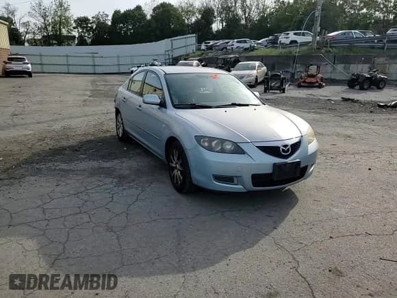 ✅ 2007 Mazda 3 i Touring • VIN: JM1BK32G971703275 • Лот: 84647815. Опубликован ранее на Copart с пробегом 128 416 миль. Бесплатный доступ к архиву аукционных продаж из США и подробный отчёт об истории автомобиля на DreamBid. Изображение 13.