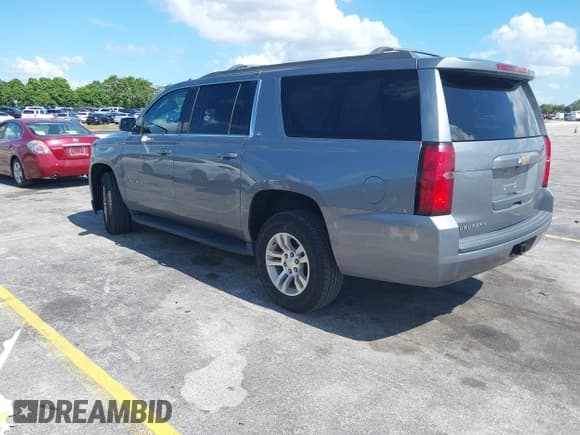 ✅ 2020 Chevrolet Suburban LT • VIN: 1GNSCHKC4LR302047 • Lot: 42518927. Listed on IAAI with 105,760 mi. Free auction sales archive from the USA and detailed vehicle history report at DreamBid. Image 3.