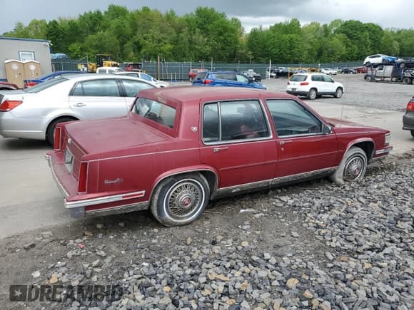 ✅ 1987 Cadillac DeVille • VIN: 1G6CD5184H4271752 • Лот: 57408765. Опубликован ранее на Copart с пробегом 102 597 миль. Бесплатный доступ к архиву аукционных продаж из США и подробный отчёт об истории автомобиля на DreamBid. Изображение 3.
