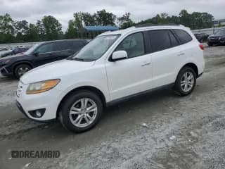 ✅ 2011 Hyundai Santa Fe Limited • VIN: 5XYZK4AG0BG051869 • Lot: 67940835. Listed on Copart with 154,935 mi. Free auction sales archive from the USA and detailed vehicle history report at DreamBid. Image 1.