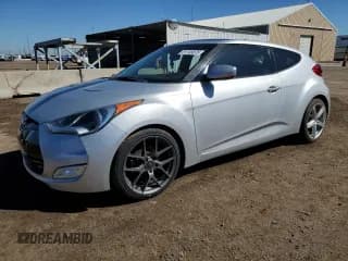 ✅ 2013 Hyundai Veloster w/Black Int • VIN: KMHTC6AD0DU152511 • Lot: 81746875. Listed on Copart with 99,675 mi. Free auction sales archive from the USA and detailed vehicle history report at DreamBid. Image 1.