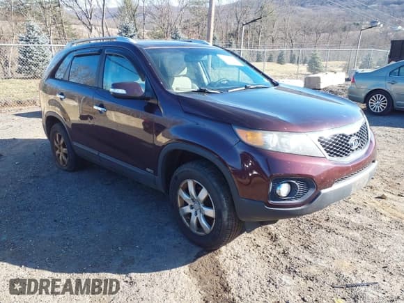 ✅ 2011 Kia Sorento LX • VIN: 5XYKTCA10BG175984 • Lot: 43884446. Listed on IAAI with 214,495 mi. Free auction sales archive from the USA and detailed vehicle history report at DreamBid. Image 1.