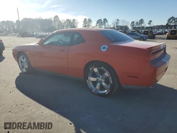 ✅ 2009 Dodge Challenger R/T • VIN: 2B3LJ54T59H511449 • Lot: 88753985. Wystawiony na Copart z przebiegiem 100 297 mil. Bezpłatny archiwum sprzedaży aukcyjnych z USA i szczegółowy raport historii pojazdu na DreamBid. Zdjęcie 2.