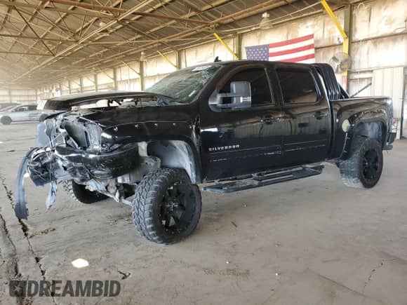 2013 Chevrolet Silverado 1500 LT с VIN 3GCPKSE74DG232774, выставлен на аукционе Copart как лот 85376485 с пробегом 183 767 миль миль и Списание • Salvage title. История ставок и продаж доступна на DreamBid. Изображение 1.