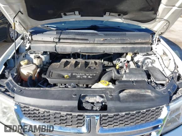 2013 Dodge Journey American Value с VIN 3C4PDCABXDT537214, выставлен на аукционе IAAI как лот 43618834 с пробегом 219 015 миль миль и . История ставок и продаж доступна на DreamBid. Изображение 10.