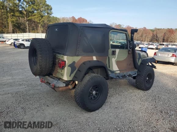 ✅ 2002 Jeep Wrangler Sport • VIN: 1J4FA49S82P750818 • Lot: 93632335. Wystawiony na Copart z przebiegiem 237 984 mil. Bezpłatny archiwum sprzedaży aukcyjnych z USA i szczegółowy raport historii pojazdu na DreamBid. Zdjęcie 3.