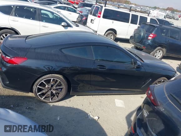 ✅ 2022 BMW 8 Series M850i xDrive • VIN: WBABC4C06NCG86571 • Lot: 43616622. Listed on IAAI with 5,383 mi. Free auction sales archive from the USA and detailed vehicle history report at DreamBid. Image 13.