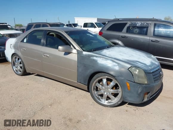 ✅ 2003 Cadillac CTS • VIN: 1G6DM57N030165770 • Lot: 42762640. Listed on IAAI with 143,599 mi. Free auction sales archive from the USA and detailed vehicle history report at DreamBid. Image 1.