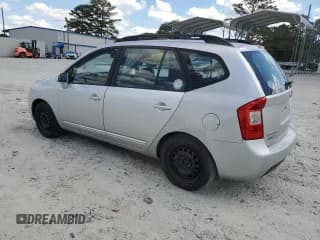 ✅ 2009 Kia Rondo LX • VIN: KNAFG528897229906 • Лот: 70821774. Опубликован ранее на Copart с пробегом 126 423 миль. Бесплатный доступ к архиву аукционных продаж из США и подробный отчёт об истории автомобиля на DreamBid. Изображение 2.