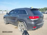 ✅ 2014 Jeep Grand Cherokee Overland • VIN: 1C4RJFCG2EC572628 • Lot: 42874326. Listed on IAAI with 129,145 mi. Free auction sales archive from the USA and detailed vehicle history report at DreamBid. Image 3.