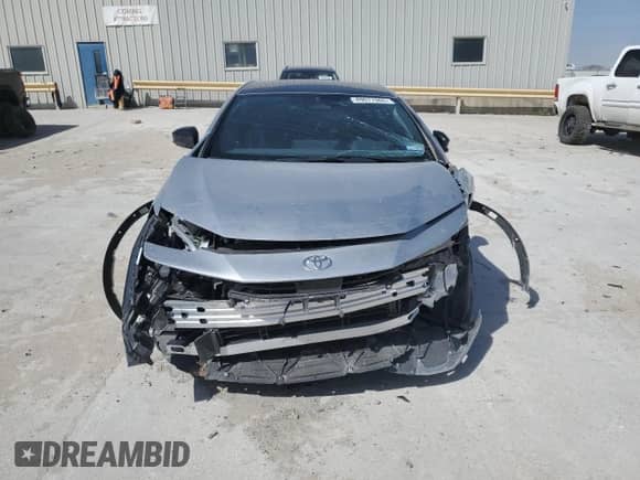 2024 Toyota Prius LE с VIN JTDACAAU4R3033761, выставлен на аукционе Copart как лот 49677065 с пробегом 8 148 миль миль и Списание • Salvage title. История ставок и продаж доступна на DreamBid. Изображение 5.