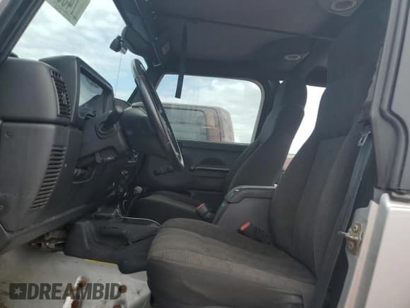 ✅ 2003 Jeep Wrangler Rubicon • VIN: 1J4FA69S53P340085 • Lot: 74564574. Listed on Copart with Not provided. Free auction sales archive from the USA and detailed vehicle history report at DreamBid. Image 7.